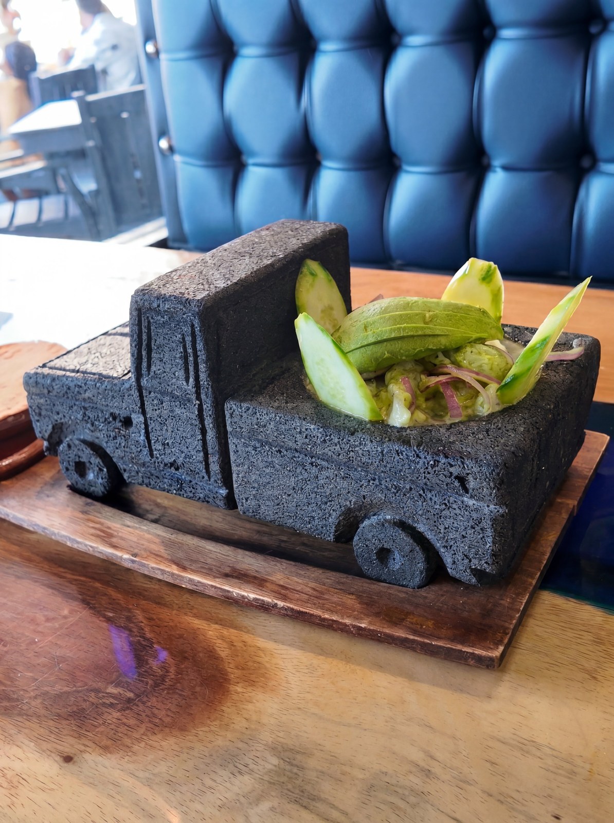 Aguachile served in stone truck vessel